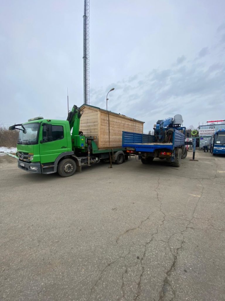 Перевозка бытовки на манипуляторе-эвакуаторе